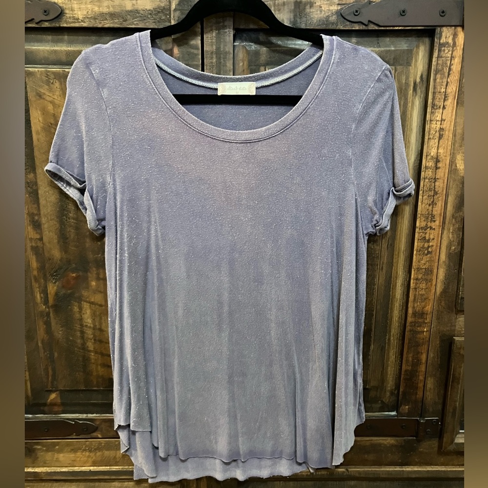 medium, purple shirt